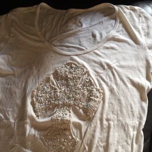 Cream colored top from Buckle. Has sequins on it